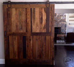 chestnut sliding wood door with vintage antique barn hardware