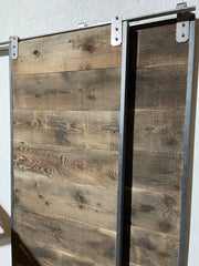 Bypass barn door track and reclaimed lumber doors