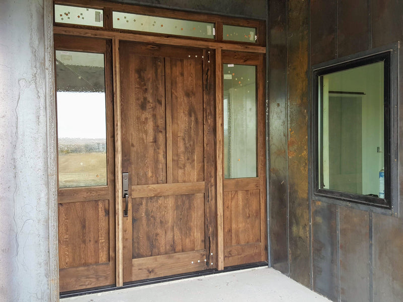 The exterior view of entry system made from reclaimed oak.