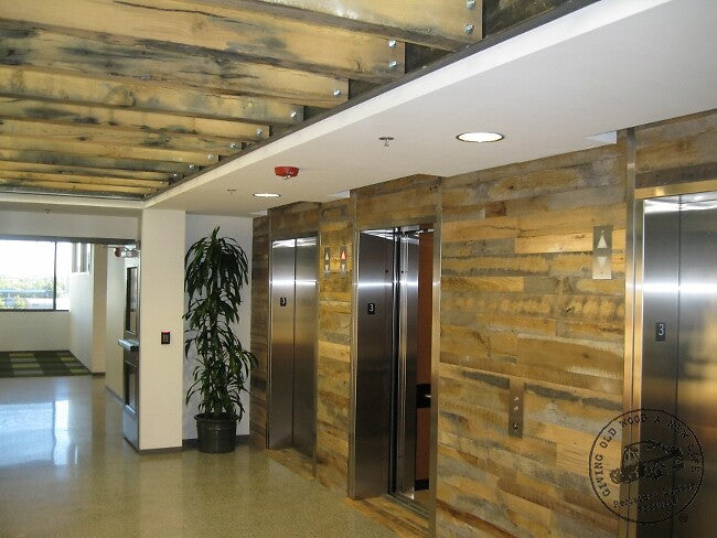 commercial elevator lobby in reclaimed wood