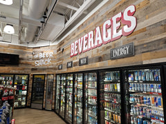 convenience store coolers with reclaimed wall paneling