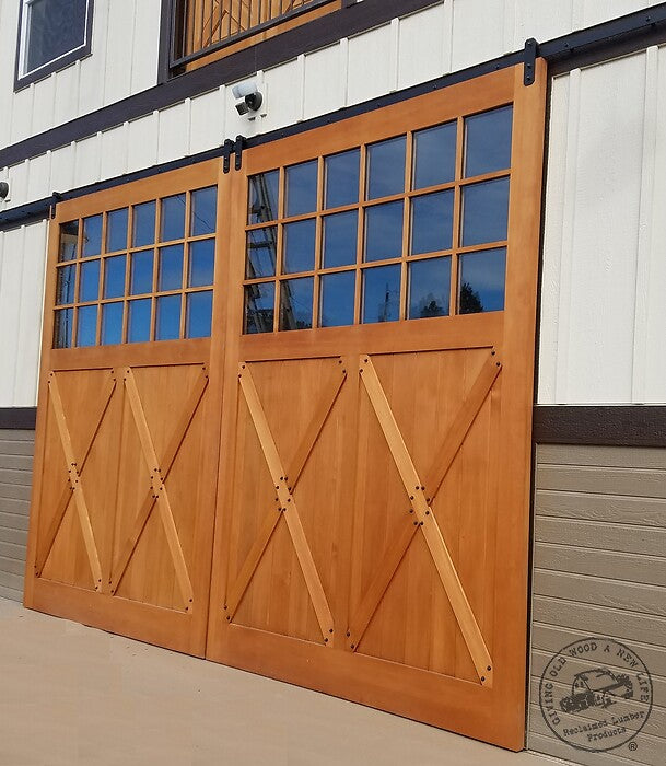 pair vertical grain fir and glass sliding barn doors