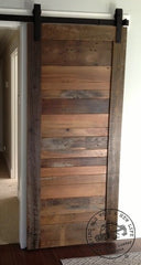 sliding reclaimed wood door with natural grey dye