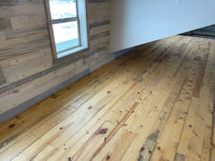 wide plank pine wood floor & shiplap walls