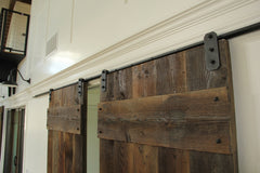 crown molding over double barn doors on low profile barn door hardware track kits